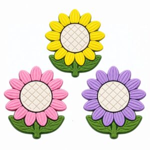 Apliques emborrachados de girassol 3.5cm nas cores amarela, rosa e lilás, com folhas verdes e miolo branco.